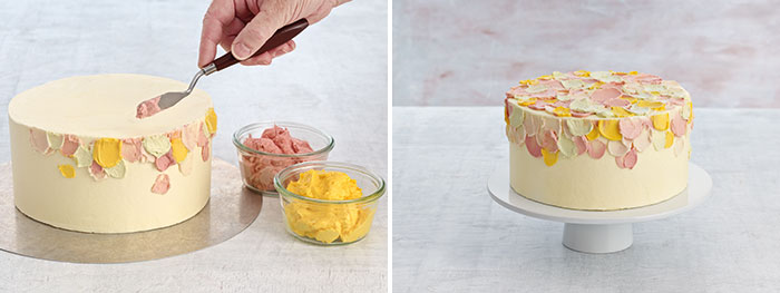 Two images: The left image is a white cake being painted on the sides with dollops of pink and yellow buttercream with a palette knife, with the pink and yellow frosting in glass bowls to the right. The right image is a finished cake with palette knife dollops of the top and upper sides of with cake in pink and yellow buttercream. 